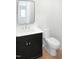 Bathroom with a modern sink, vanity, mirror, and toilet at 1444 Old Apex Rd, Cary, NC 27513