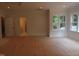Bright bedroom with three doors including one to the ensuite bathroom at 1444 Old Apex Rd, Cary, NC 27513