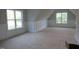 Bedroom with wainscoting and natural light at 1444 Old Apex Rd, Cary, NC 27513