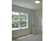 Bonus room with natural light streaming through the large windows at 1444 Old Apex Rd, Cary, NC 27513