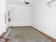 Clean garage space with brick border, offering a functional area for parking and storage at 1444 Old Apex Rd, Cary, NC 27513