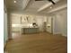 Spacious open kitchen featuring an island, modern appliances, and stylish pendant lighting at 1444 Old Apex Rd, Cary, NC 27513