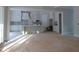 Modern kitchen featuring white cabinets, a large island, and an open layout at 1444 Old Apex Rd, Cary, NC 27513