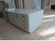Expansive kitchen island featuring storage, drawers, and a sleek countertop at 1444 Old Apex Rd, Cary, NC 27513
