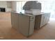 Spacious kitchen island with cabinets, drawers, and a countertop at 1444 Old Apex Rd, Cary, NC 27513