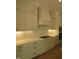 Kitchen with white cabinets, subway tile backsplash, stainless steel gas range, and modern countertops at 1444 Old Apex Rd, Cary, NC 27513