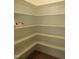 Walk-in pantry with ample shelving space at 1444 Old Apex Rd, Cary, NC 27513
