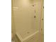 Modern walk-in shower features tiled walls and a sleek design at 1444 Old Apex Rd, Cary, NC 27513