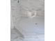 Close up showcasing a white-tiled shower floor, designed with great attention to detail at 1444 Old Apex Rd, Cary, NC 27513