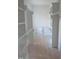 Walk-in closet with custom shelving and storage space at 1444 Old Apex Rd, Cary, NC 27513