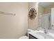 Cozy bathroom featuring a vanity with sink, toilet, and enclosed shower at 1613 Waddell Ct, Durham, NC 27703