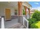 Charming front porch with stone accents, wooden pillars, and a welcoming entrance at 1613 Waddell Ct, Durham, NC 27703