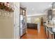 Well-equipped kitchen with stainless steel refrigerator and a convenient center island at 1613 Waddell Ct, Durham, NC 27703