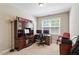 Home office space with multiple desks and ample natural light at 1613 Waddell Ct, Durham, NC 27703