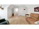 Bonus room with hard wood floors, a brown couch, and mounted deer head at 165 Alpine Rd, Moncure, NC 27559