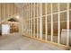 Unfinished attic space with exposed beams and wooden framing ready to be converted to living area at 165 Alpine Rd, Moncure, NC 27559