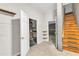 Unfinished basement with stairs and storage, providing ample space for customization and organization at 1767 Quince Loop, Sanford, NC 27332