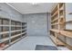Spacious basement with concrete walls and shelving offers customizable storage and workspace at 1767 Quince Loop, Sanford, NC 27332