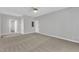 Large bedroom featuring neutral carpet and ceiling fan, offering a peaceful retreat at 1767 Quince Loop, Sanford, NC 27332