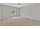 Relaxing bedroom with a ceiling fan and a large window that lets in plenty of natural light at 1767 Quince Loop, Sanford, NC 27332