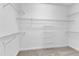 Walk-in closet with adjustable wire shelving, maximizing storage space and organization at 1767 Quince Loop, Sanford, NC 27332