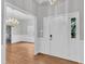 Welcoming foyer area with hardwood floors, and an inviting atmosphere, perfect for greeting guests at 1767 Quince Loop, Sanford, NC 27332