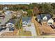 Property lines are approximate in this aerial view of the charming light blue home with well-manicured lawn at 2015 Cheek Rd, Durham, NC 27704