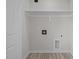 Dedicated laundry room with shelving and ready for washer and dryer hookups at 2015 Cheek Rd, Durham, NC 27704