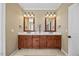 Double vanity sinks in this neutral and bright bathroom at 208 Bellagio Dr, Apex, NC 27539