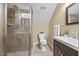 Bathroom with a glass-enclosed shower, a white toilet, and modern fixtures at 208 Bellagio Dr, Apex, NC 27539
