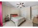 Cozy bedroom with a large window providing natural light and a comfortable bed at 208 Bellagio Dr, Apex, NC 27539