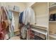 Organized closet with shelving, hanging rods, and ample storage space for clothes and accessories at 208 Bellagio Dr, Apex, NC 27539