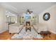 Inviting living area features a fireplace, comfortable seating, and an open layout at 208 Bellagio Dr, Apex, NC 27539