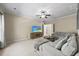 Welcoming living room with entertainment center and large sectional sofa at 208 Bellagio Dr, Apex, NC 27539
