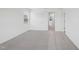 Neutral bedroom with carpet, a window and a view to a bathroom across the hall at 2107 Glen Crossing Dr, Durham, NC 27704