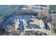 Aerial view of a new construction community featuring townhomes and a winding road at 2109 Glen Crossing Dr, Durham, NC 27704