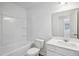 Bathroom with bathtub, toilet, single sink vanity and shower head ready for use at 2109 Glen Crossing Dr, Durham, NC 27704