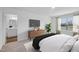 Bright bedroom with comfortable furnishings, a large window, and ensuite bathroom access at 2109 Glen Crossing Dr, Durham, NC 27704