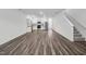Expansive living space blending living and kitchen areas with modern finishes and ample natural light at 2109 Glen Crossing Dr, Durham, NC 27704