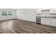 Spacious room with wood-look floors and natural light from the double window at 2109 Glen Crossing Dr, Durham, NC 27704