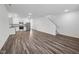 Bright open floorplan with a modern kitchen, dining area, and staircase at 2109 Glen Crossing Dr, Durham, NC 27704