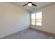 Unfurnished bedroom features carpet and a window with a view of outside at 2205 Gathering Square Ct, Fuquay Varina, NC 27526