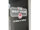 The Meat House sign lists the business name and hours of operation at 2205 Gathering Square Ct, Fuquay Varina, NC 27526
