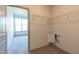 Organized walk-in closet with built-in shelving and easy access to bedroom at 2205 Gathering Square Ct, Fuquay Varina, NC 27526