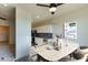 Bright dining area with modern decor and open access to the kitchen at 2316 Gathering Square Ct, Fuquay Varina, NC 27526
