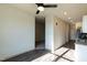 Spacious living area with hardwood flooring and an open floor plan to kitchen at 2316 Gathering Square Ct, Fuquay Varina, NC 27526