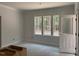 Bright bedroom with large window and neutral walls, ready for personalization and decoration at 328 Green Pines Estates Dr, Kenly, NC 27542