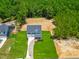 New home with a spacious, well-maintained lawn in a serene, wooded neighborhood at 355 Beacon Hill Rd # 23, Lillington, NC 27546