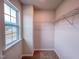 Bedroom closet with carpet, window, and built-in shelving at 355 Beacon Hill Rd # 23, Lillington, NC 27546