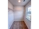 Bedroom walk-in closet with window and wire shelving at 355 Beacon Hill Rd # 23, Lillington, NC 27546